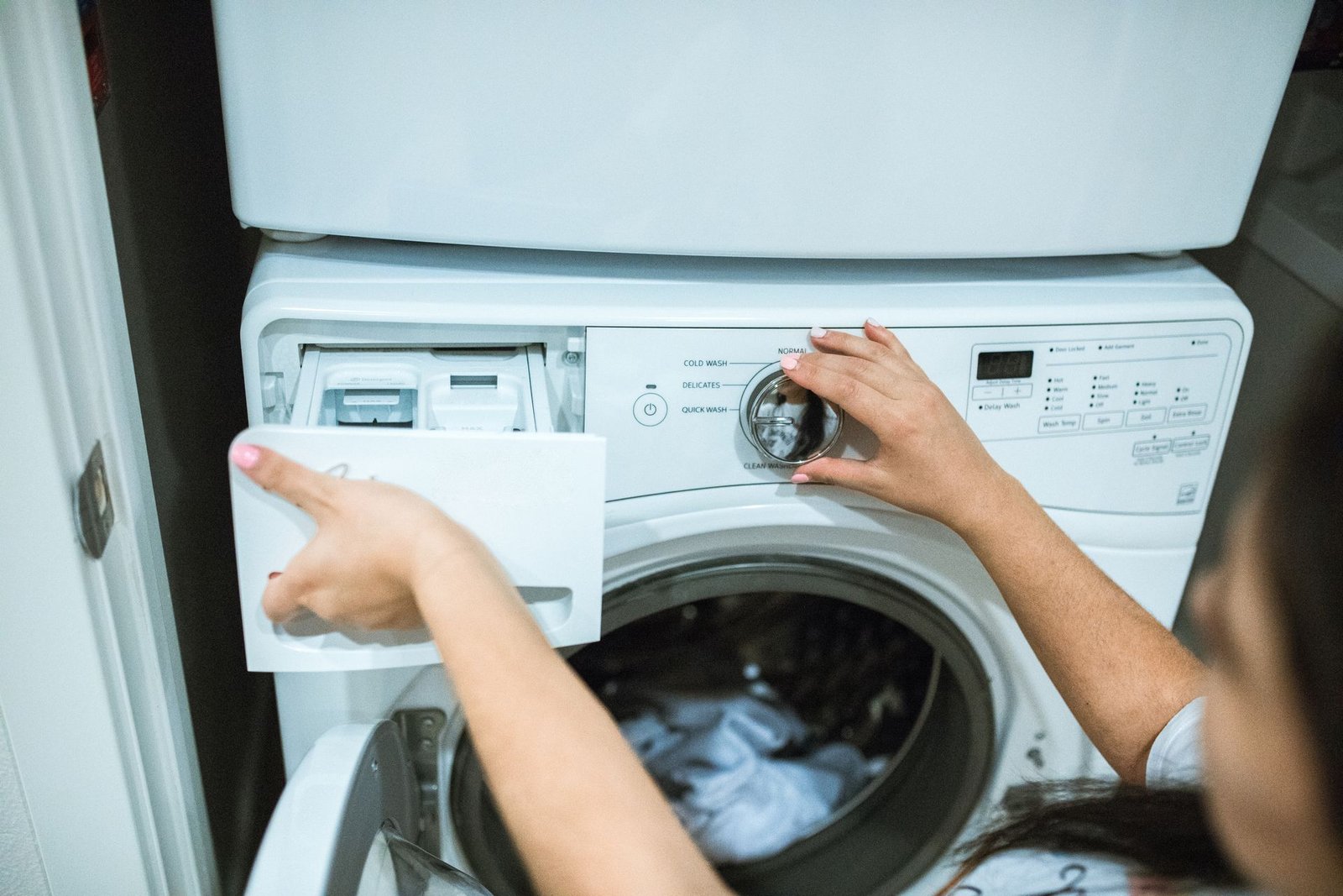 Professional laundry machines inside a clean facility